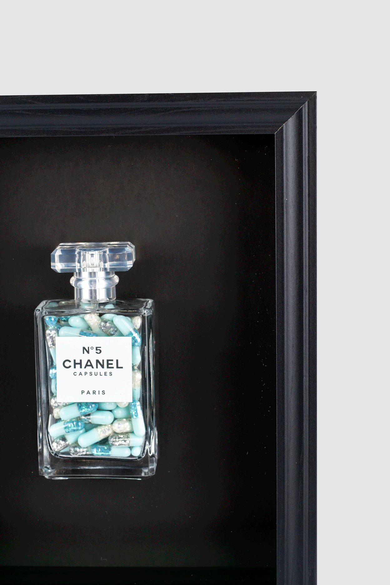Chanel No.5 Capsules - (Black Frame / Blue Pills) by Emma Gibbons